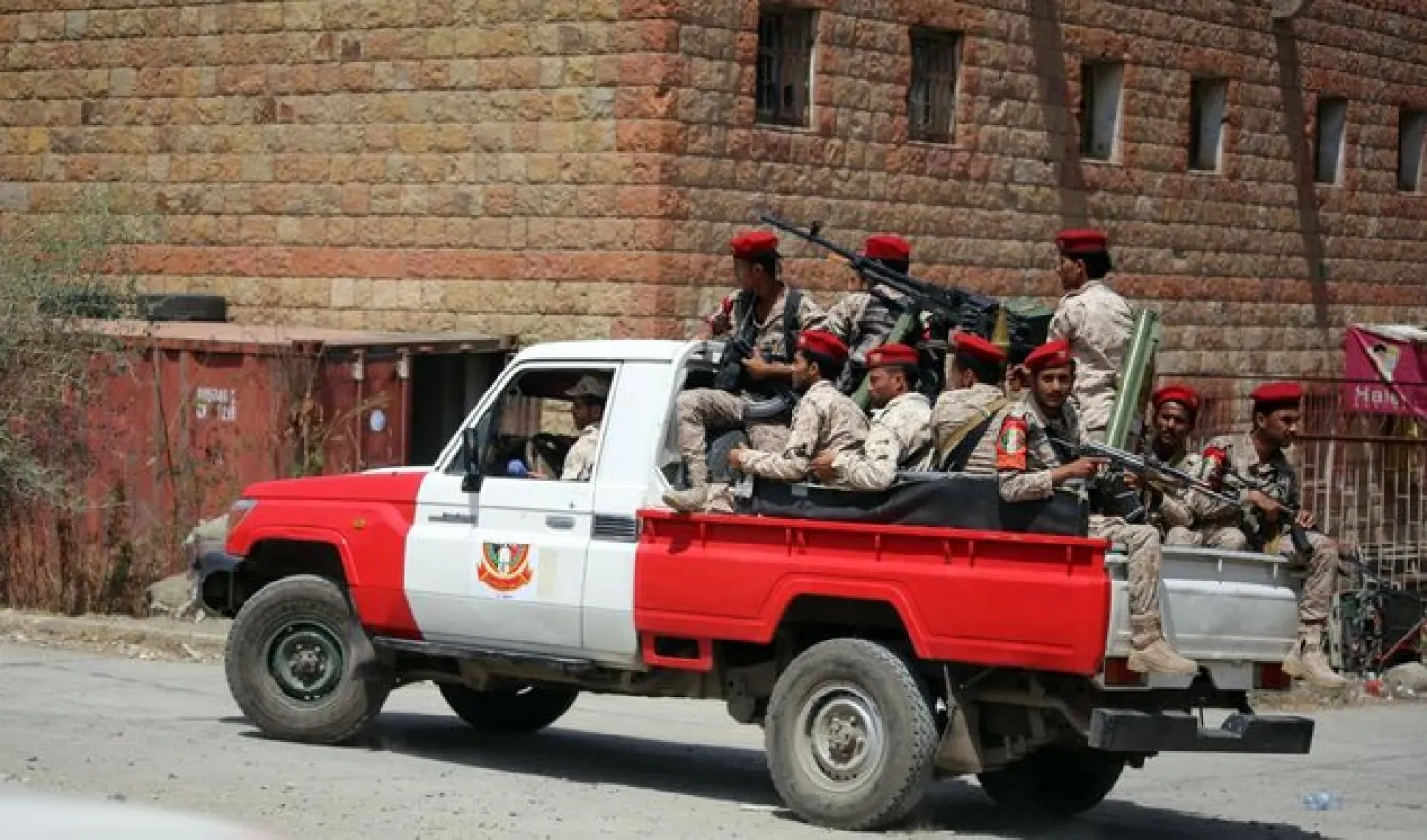 Yemeni military policemen patrol the streets of the city of Taez, on March 13, 2018. (AFP)