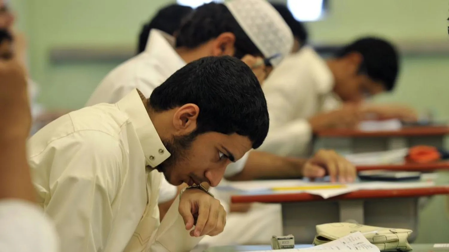 Saudi students sit for their final high school exams in the Red Sea port city of Jeddah. (AFP)