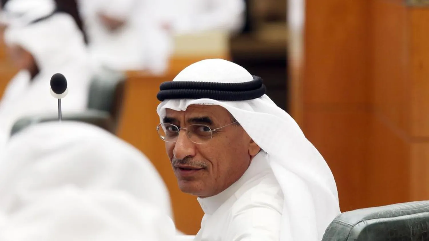 Kuwaiti Oil Minister Bakheet al-Rashidi speaks during a parliamentary questioning session at the Kuwait National Assembly in Kuwait City on May 1, 2018. Yasser Al Zayyat / AFP  