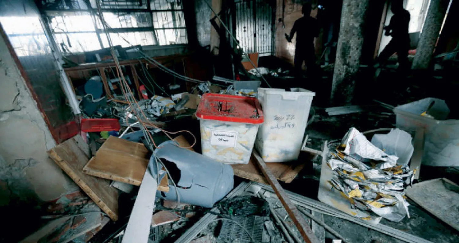 مقر المفوضية الوطنية العليا للانتخابات بعد تعرضه لهجوم إرهابي الأربعاء الماضي (رويترز)