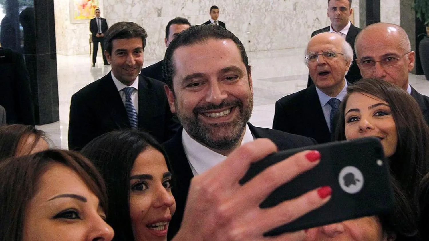 Hariri takes a selfie with journalists at the presidential palace near Beirut, Lebanon, on November 3, 2016. Mohamed Azakir / Reuters