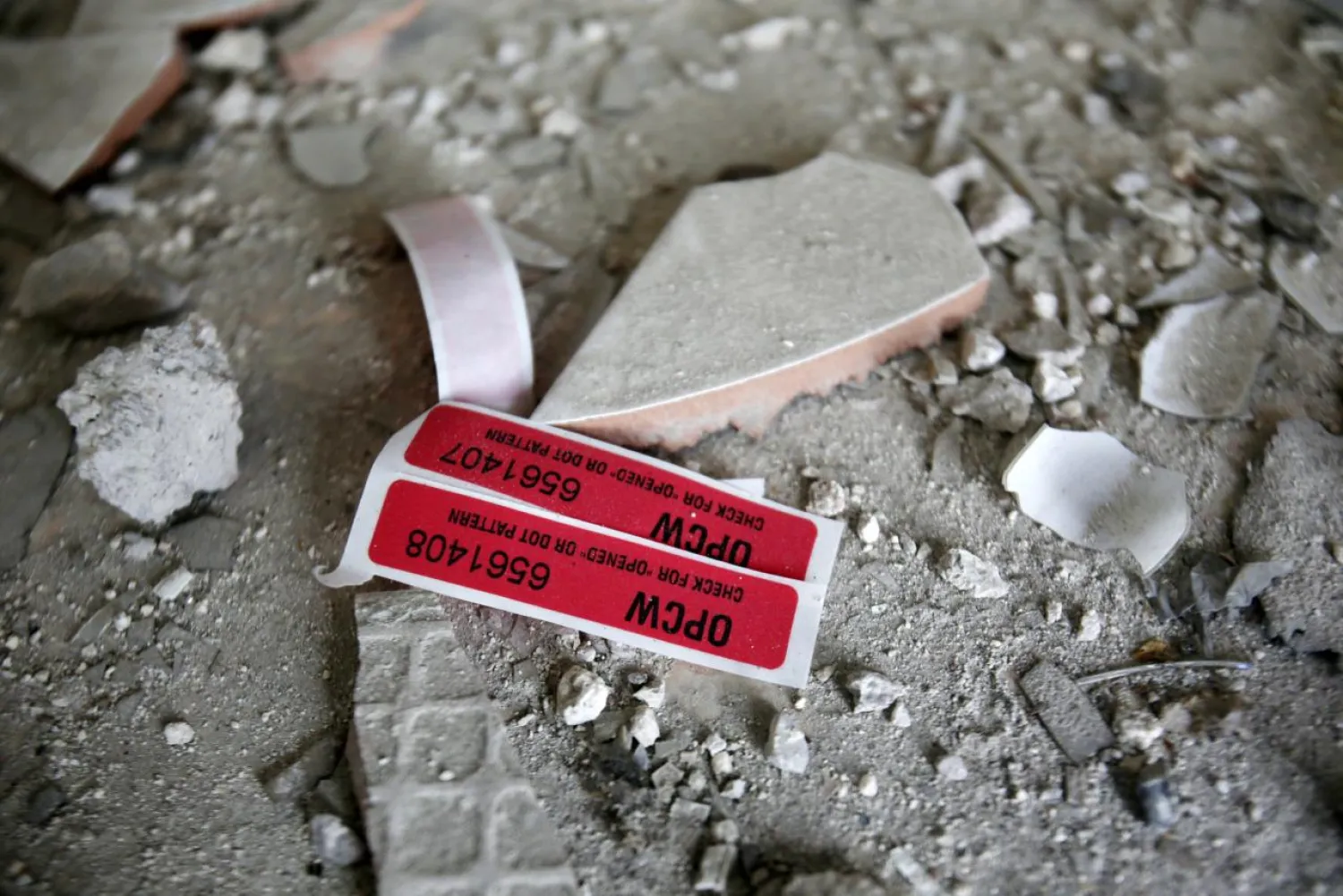 Labels of the Organization for the Prohibition of Chemical Weapons (OPCW) are seen inside a damaged house in Douma in Damascus, Syria April 23, 2018. (Reuters)