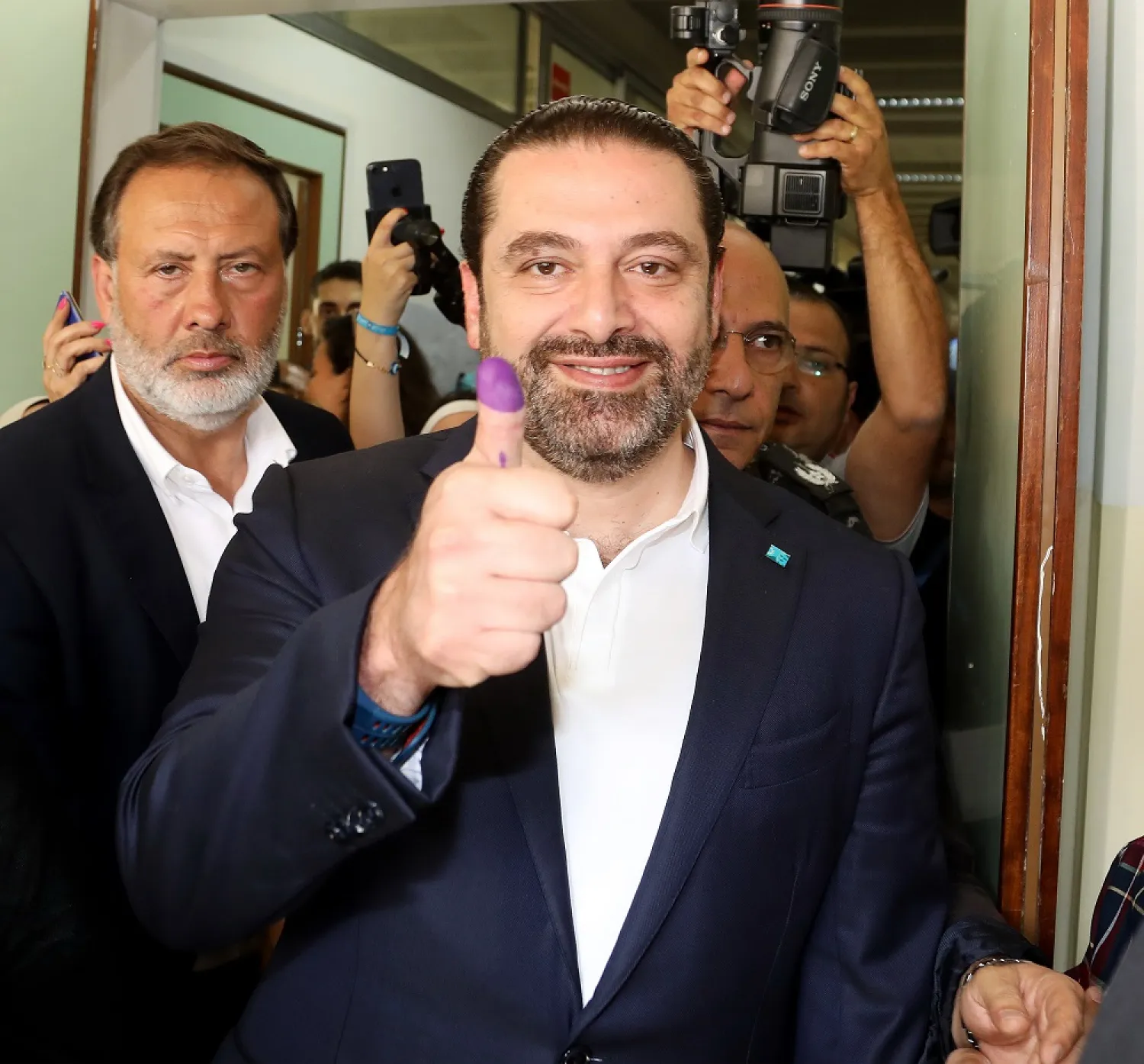 Lebanese PM Saad Hariri smiles to the cameras after casting his vote in the parliamentary elections. (Dalati & Nohra)