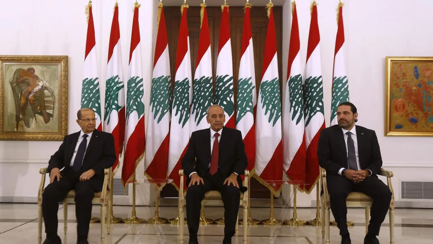 Lebanese PM Saad Hariri (R) meets President Michel Aoun (L) and Parliament speaker Nabih Berri (C) at the presidential palace in Baadba in November 2017. (AFP)