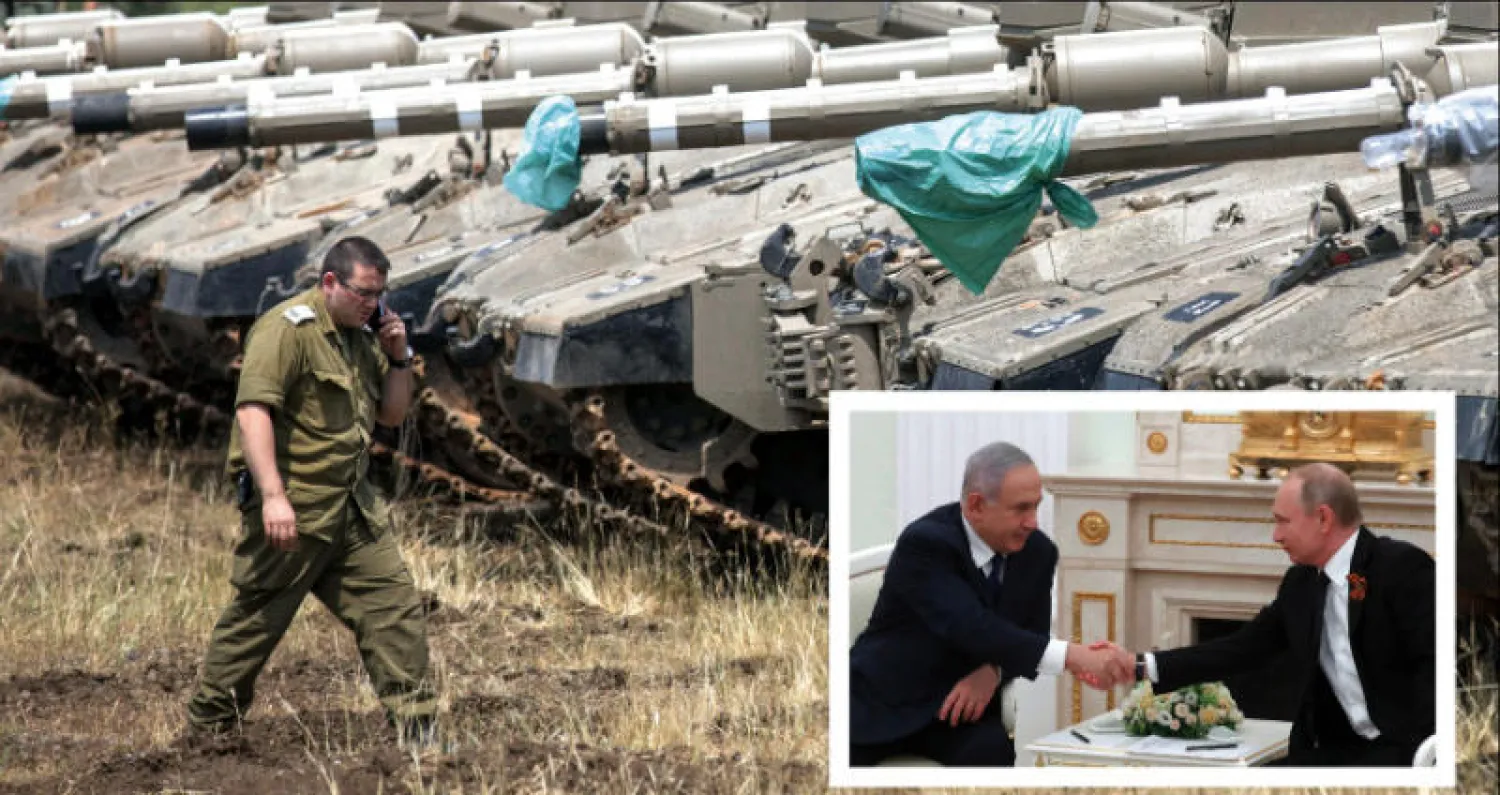 جندي إسرائيلي يمر أمام دبابات قرب مرتفعات الجولان أمس وفي الإطار بوتين ونتنياهو يتصافحان خلال اجتماعهما في موسكو أمس (إ.ب.أ)