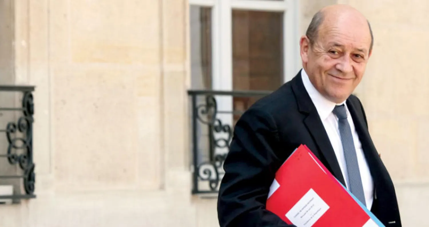 وزير الخارجية الفرنسي جان إيف لودريان يعود إلى طاولة المفاوضات في بروكسل مع نظيريه الألماني والبريطاني لبحث تداعيات انسحاب ترمب من النووي الإيراني (أ.ف.ب)