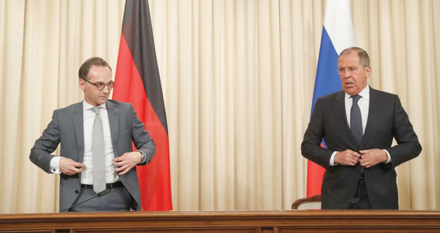 وزير الخارجية الروسي سيرغي لافروف في مؤتمر صحافي مشترك مع نظيره الألماني هايكو ماس (إ.ب.أ) 