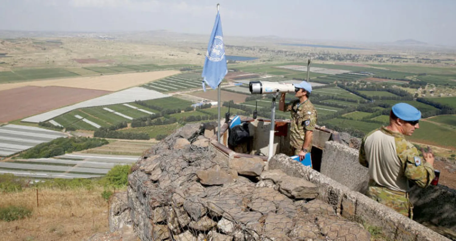 أحد مراقبي الأمم المتحدة في الجولان السوري أمس (رويترز)