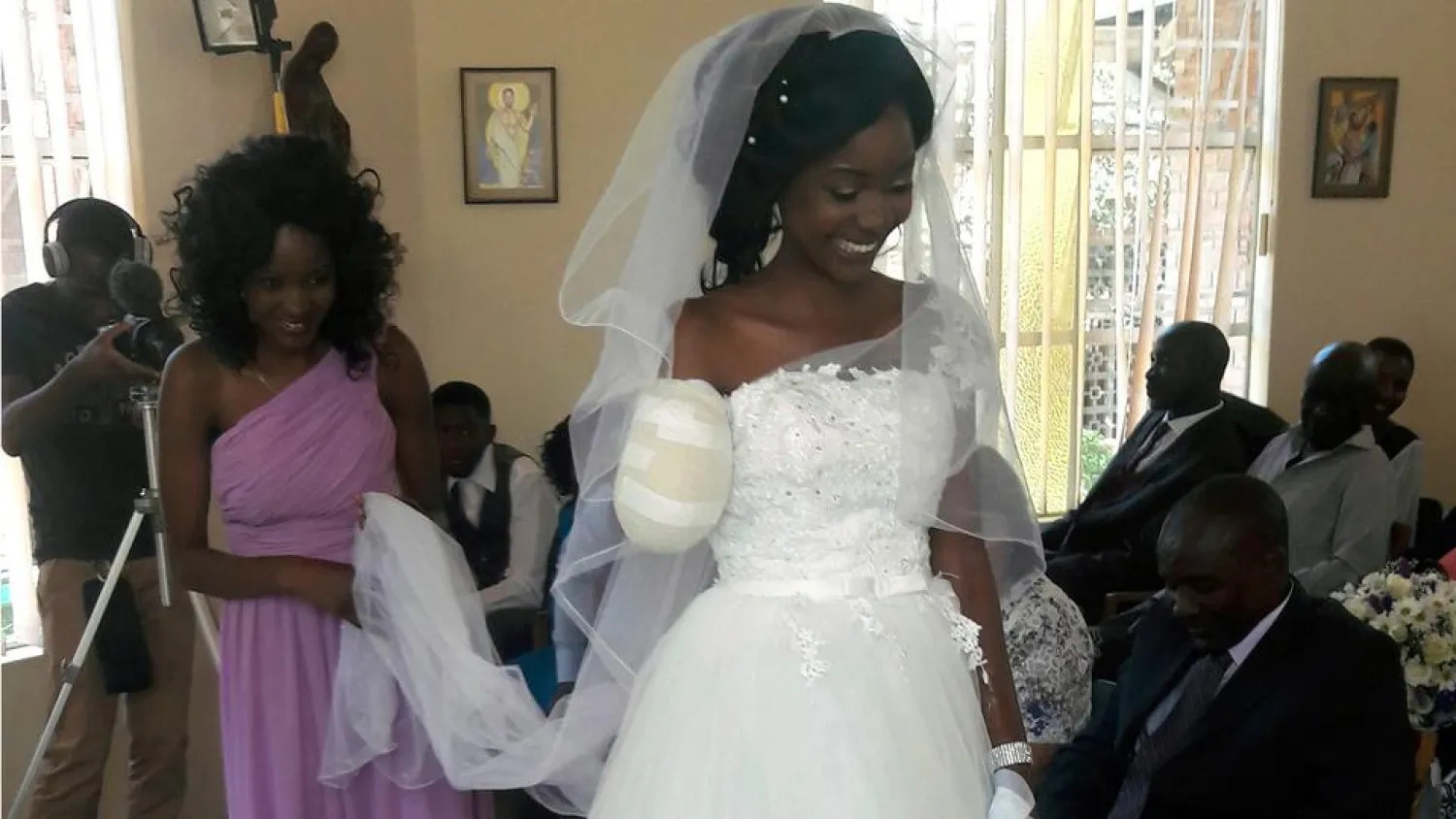 Zanele Ndlovu walks down the aisle in Zimbabwe's second city of Bulawayo. AP