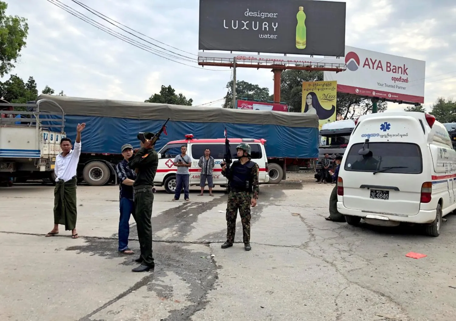 Soldiers standing guard near ambulances in the town of Muse, Shan State, Myanmar, on Saturday. At least 19 people have been killed during clashes between Myanmar forces and the Ta’ang National Liberation Army. Credit: EPA