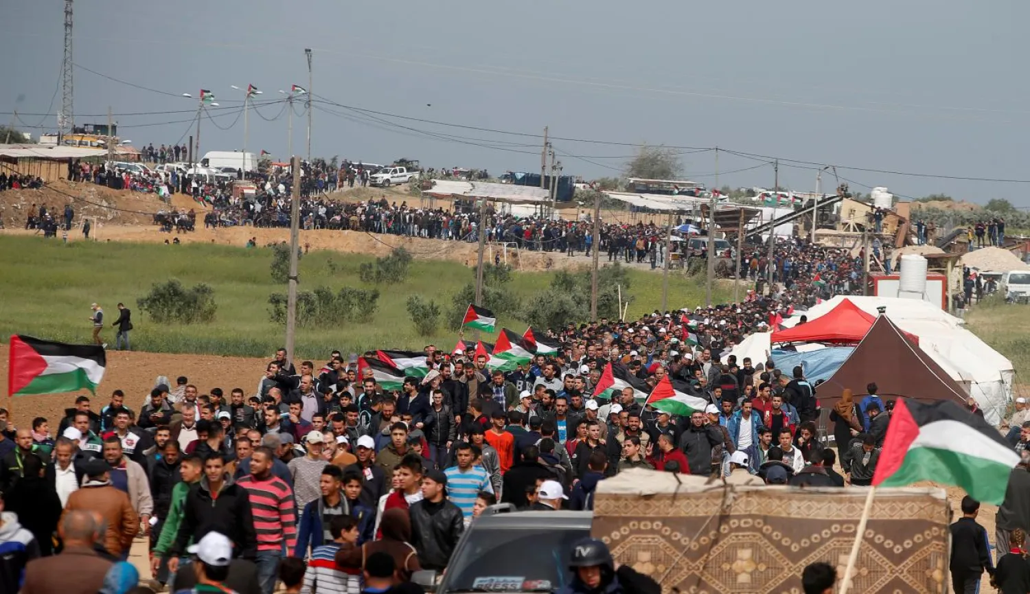 Palestinians attend a tent city protest along the Israel border with Gaza, demanding the right to return to their homeland, east of Gaza City. (Reuters)