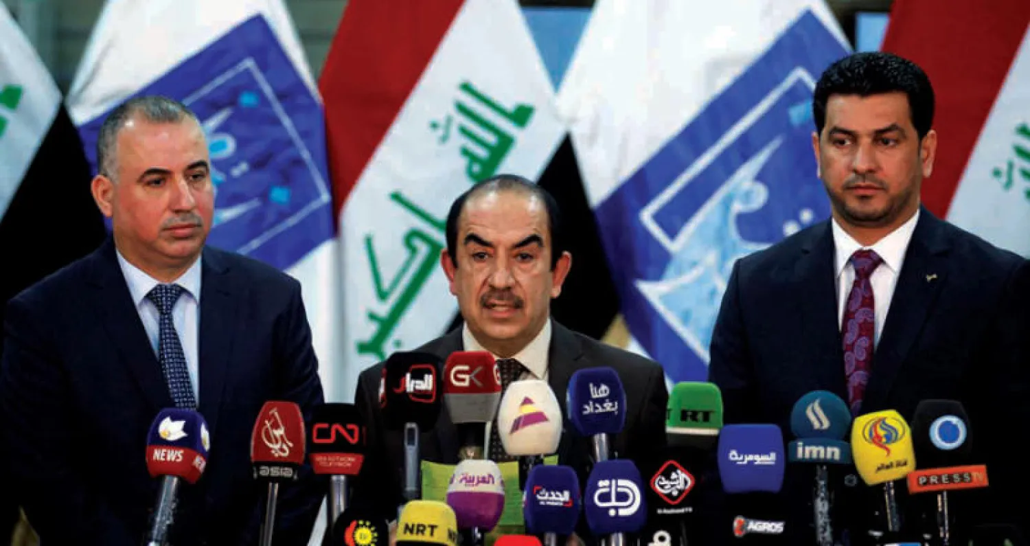 رئيس المفوضية العليا للانتخابات رياض البدران أثناء مؤتمر صحافي في بغداد أمس (رويترز)