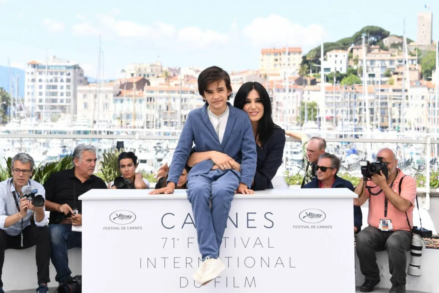 Lebanese director Nadine Labaki and young Syrian actor Zain Al Rafeea at Cannes. (AFP)