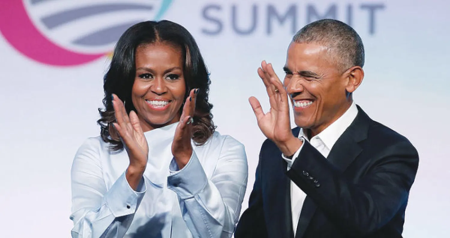 باراك وميشيل أوباما (أ.ف.ب)