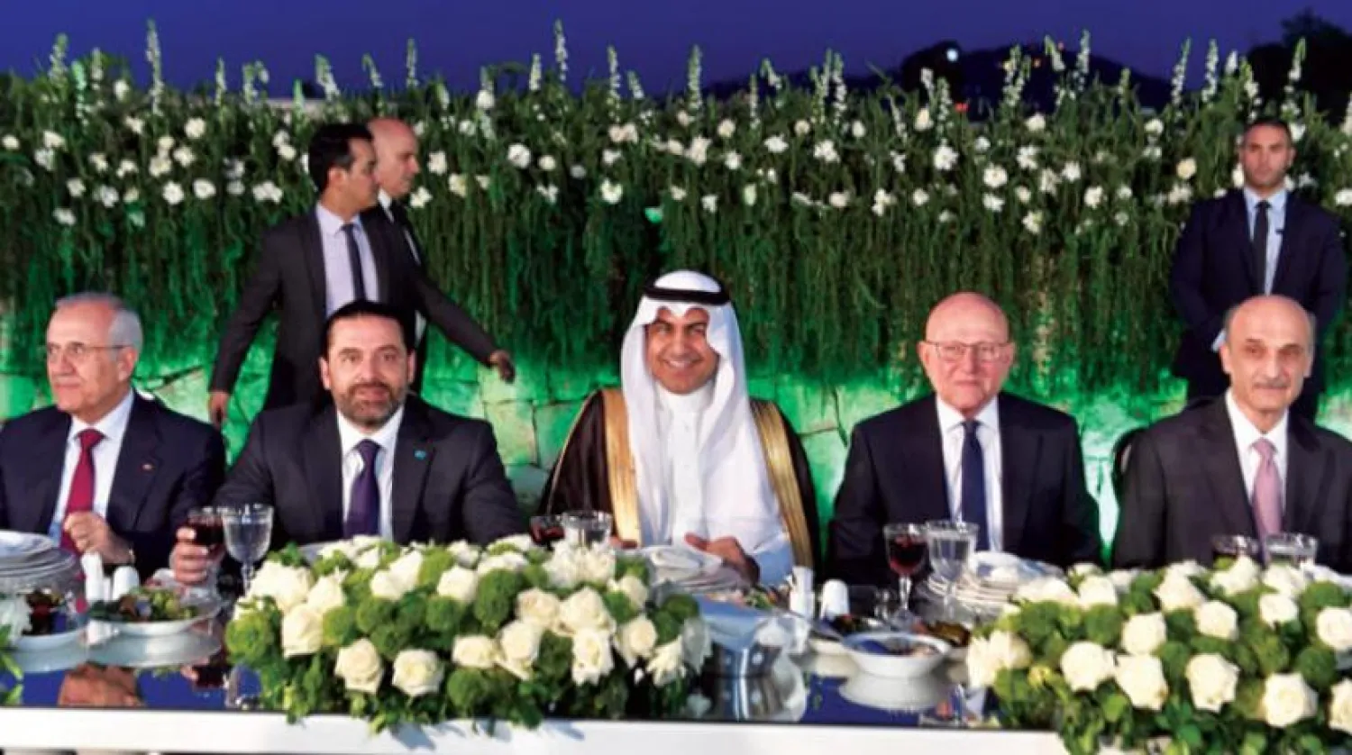  The advisor at the Saudi Royal Court, Nizar al-Aloula, surrounded by Lebanese officials and leaders during the Iftar banquet on Sunday (Asharq Al-Awsat)