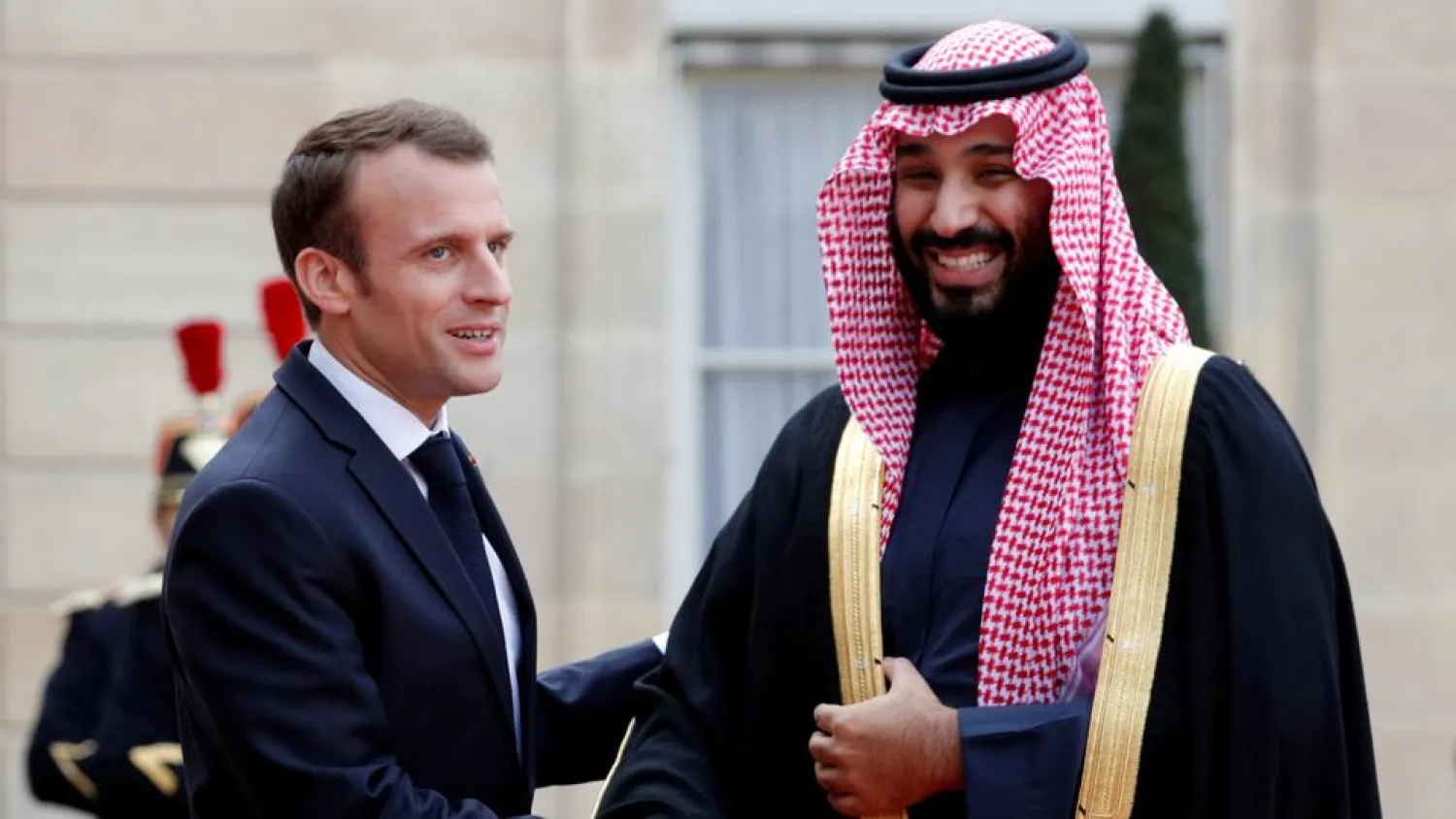 French President Emmanuel Macron welcomes Saudi Arabia's Crown Prince Mohammed bin Salman as he arrives at the Elysee Palace in Paris, France on April 10, 2018. (Reuters)