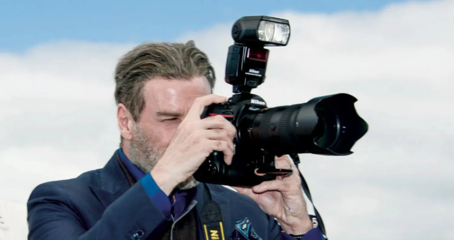 جون ترافولتا أثناء وجوده في مهرجان كان (إ.ب.أ)