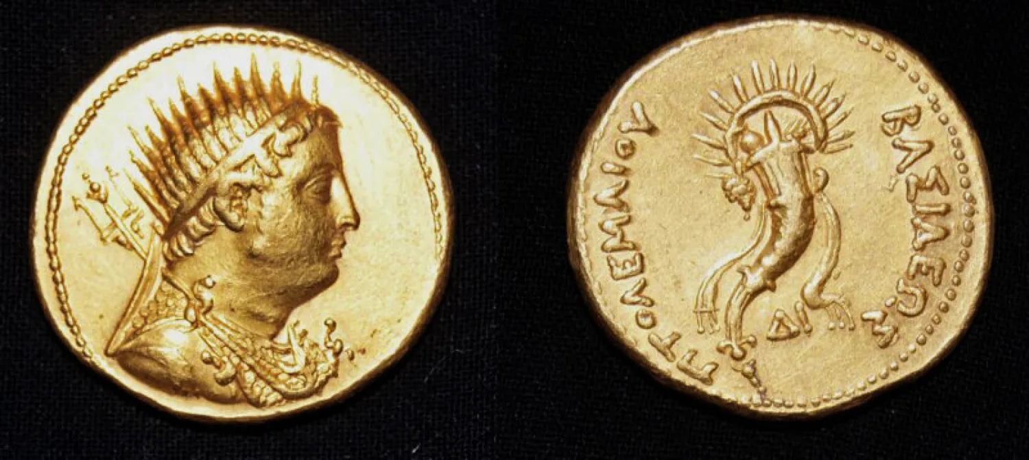 This undated photo released by the Egyptian Ministry of Antiquities, shows a gold coin, depicting King Ptolemy III that was found in the San El-Hagar archaeological site in Gharbia province, north of Cairo, Egypt. (Egyptian Ministry of Antiquities via AP) 