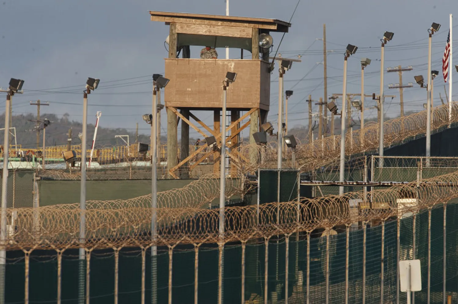 A US military member mans one of the watch towers at Camp Delta at the US Detention Center in Guantanamo Bay, Cuba Paul J. Richards/ AFP