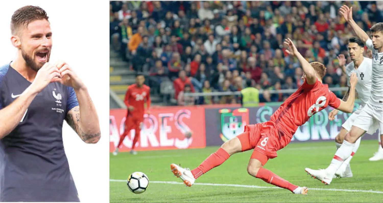 فخر الدين بن يوسف يسجل لتونس في مرمى البرتغال (أ.ب) - جيرو انضم لقائمة أفضل هدافي منتخب فرنسا (إ.ب.أ)