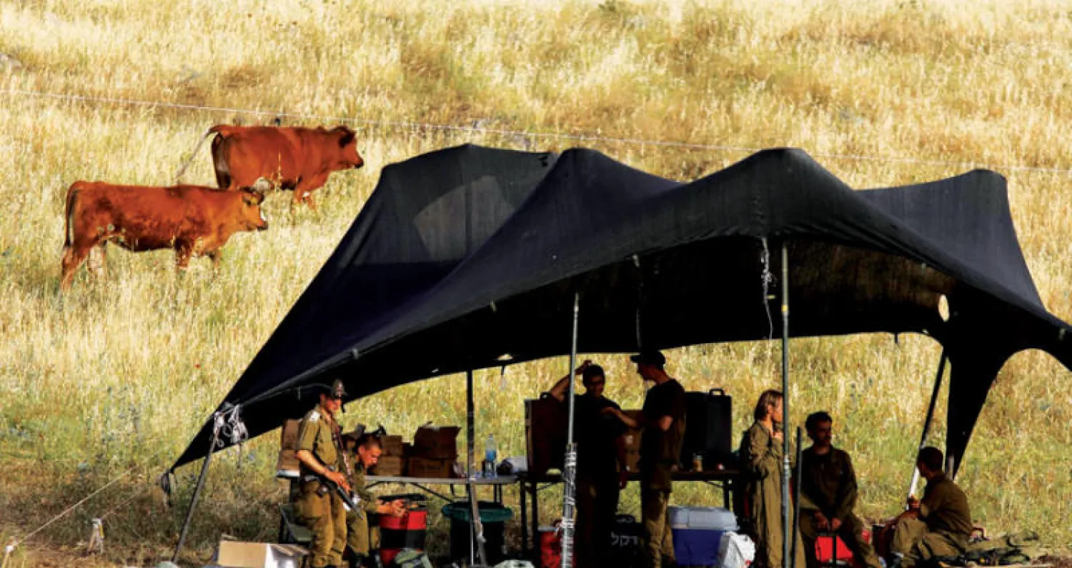 جنود إسرائيليون قرب الحدود مع سوريا في الجولان المحتل الشهر الماضي (أ.ف.ب)