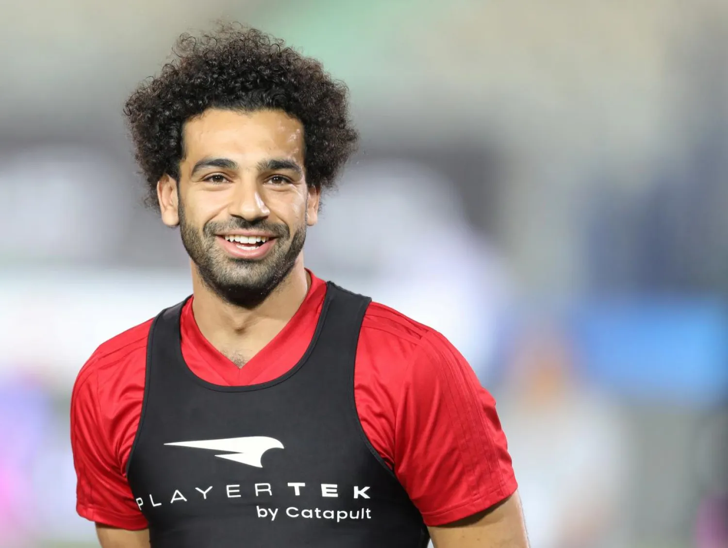  FIFA World Cup - Egypt Training - Cairo Stadium, Egypt - June 9, 2018 - Egypt's Mohamed Salah smiles next to his teammates in Cairo international stadium in Cairo. REUTERS/Mohamed Abd El Ghany