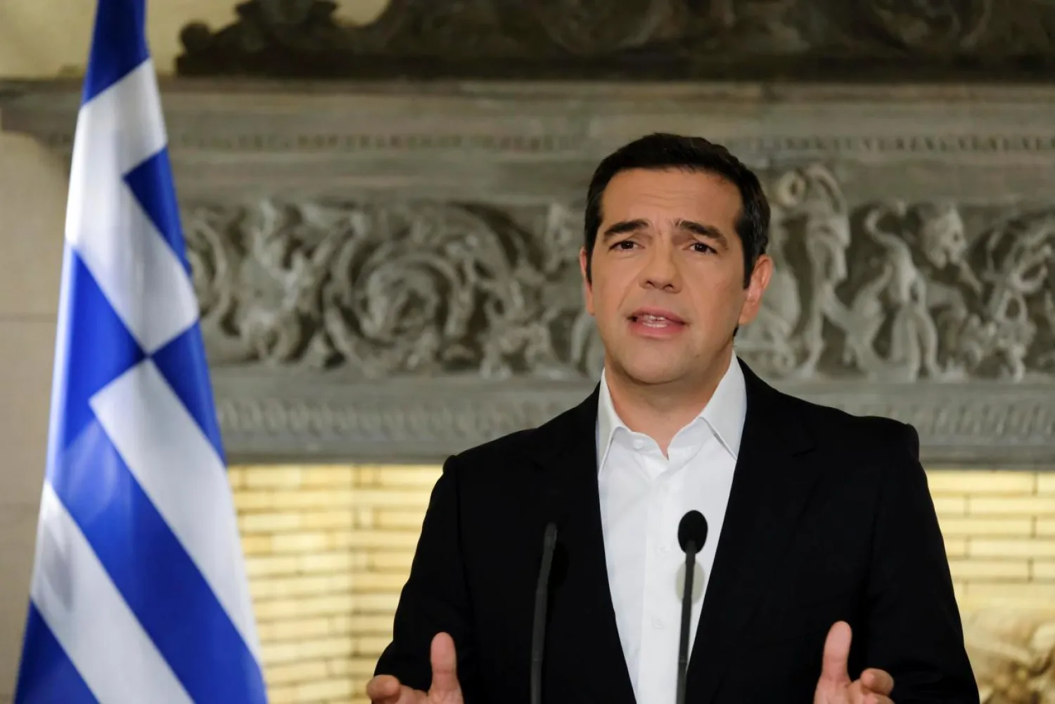 Greek Prime Minister Alexis Tsipras addresses the nation from his office in Maximos Mansion in Athens, Greece, June 12, 2018. Andrea Bonetti/Greek Prime Minister's Office/Handout via REUTERS