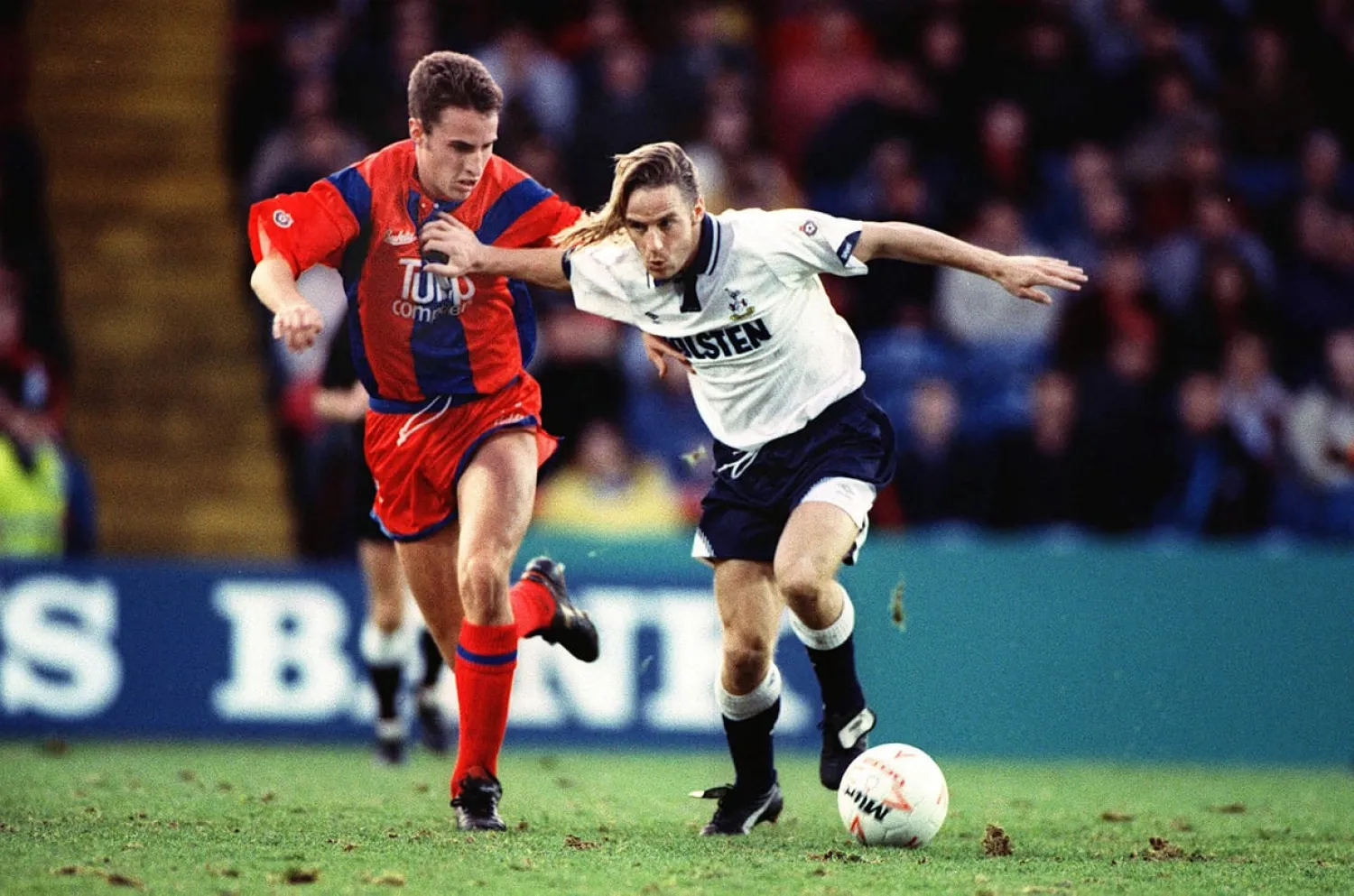 Gareth Southgate attempts to dispossess Tottenham’s Paul Walsh during a First Division game eight months after he made his Crystal Palace debut. Photograph: Colorsport/REX/Shutterstock