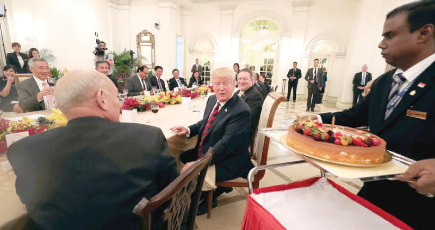 احتفل ترمب بعيد ميلاده الـ72 قبل موعده بثلاثة أيام في سنغافورة (رويترز)