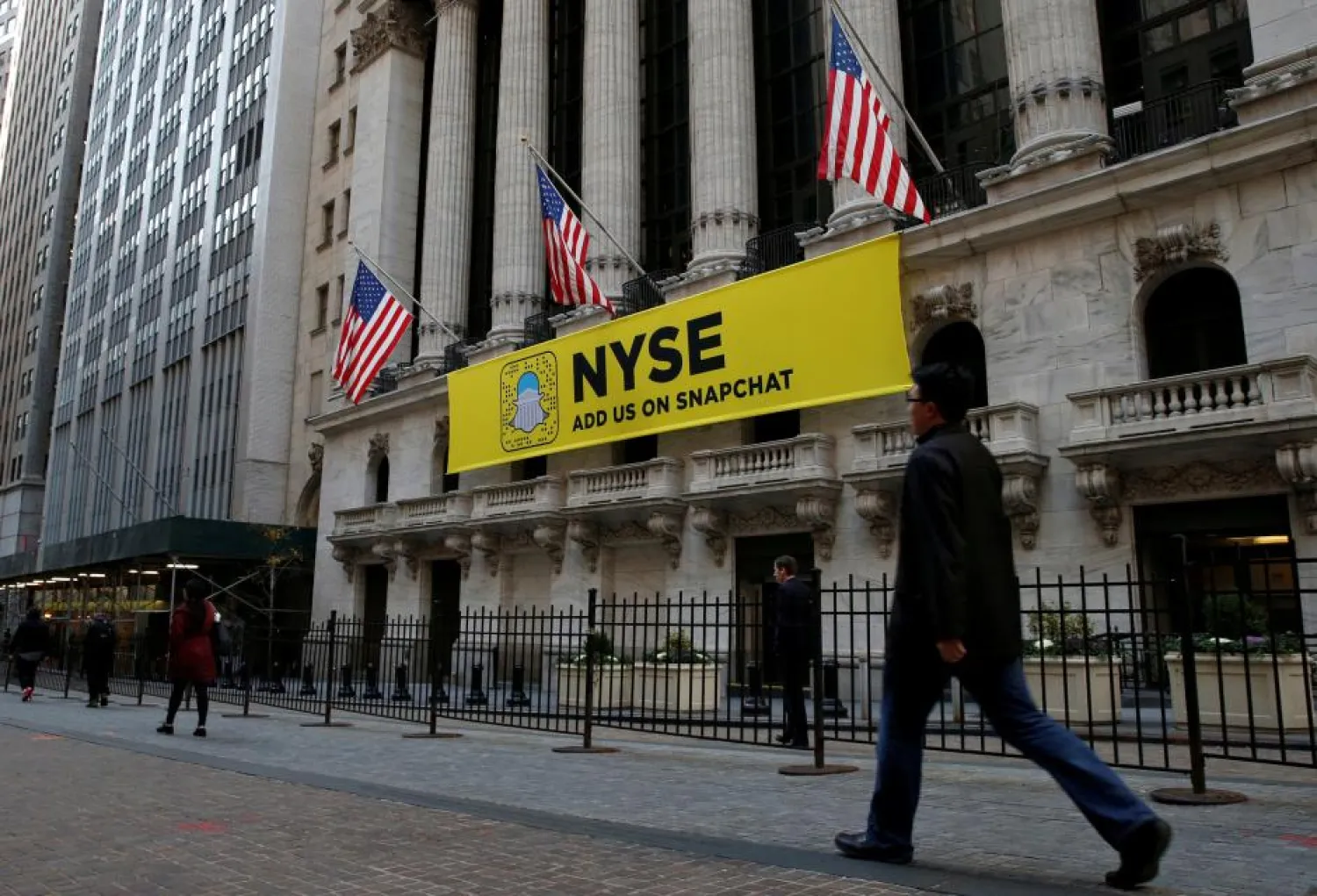 The Snapchat logo is seen on a banner outside the New York Stock Exchange (NYSE) in New York City, US on November 16, 2016. REUTERS/Brendan McDermid/File Photo 