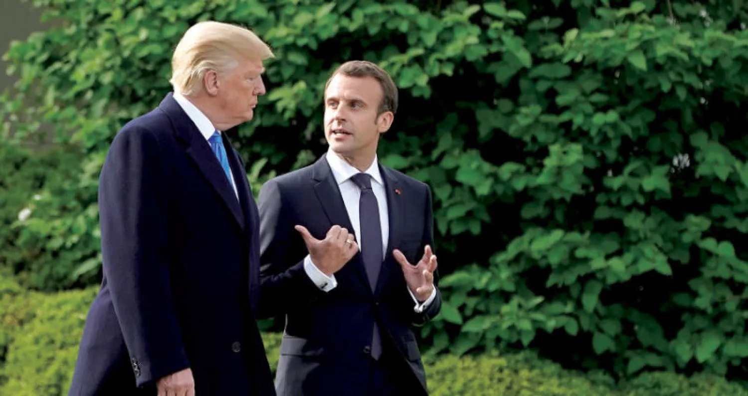 الرئيسان ترمب وماكرون في حديقة البيت الأبيض في ابريل (نيسان) الماضي (رويترز)