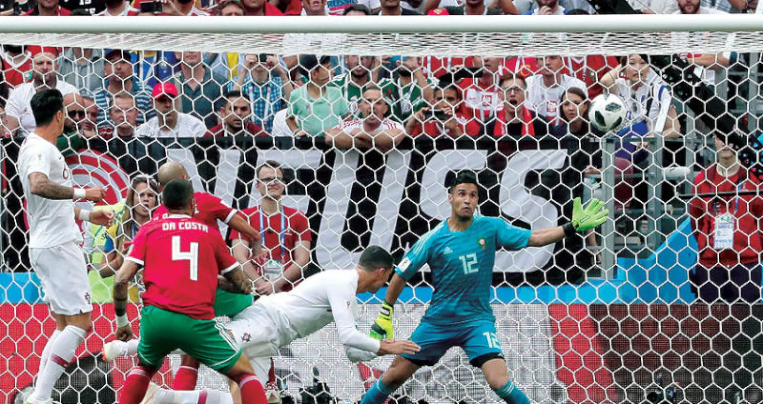 رونالدو نجم البرتغال يسجل هدف الفوز في شباك المغرب (إ.ب.أ)