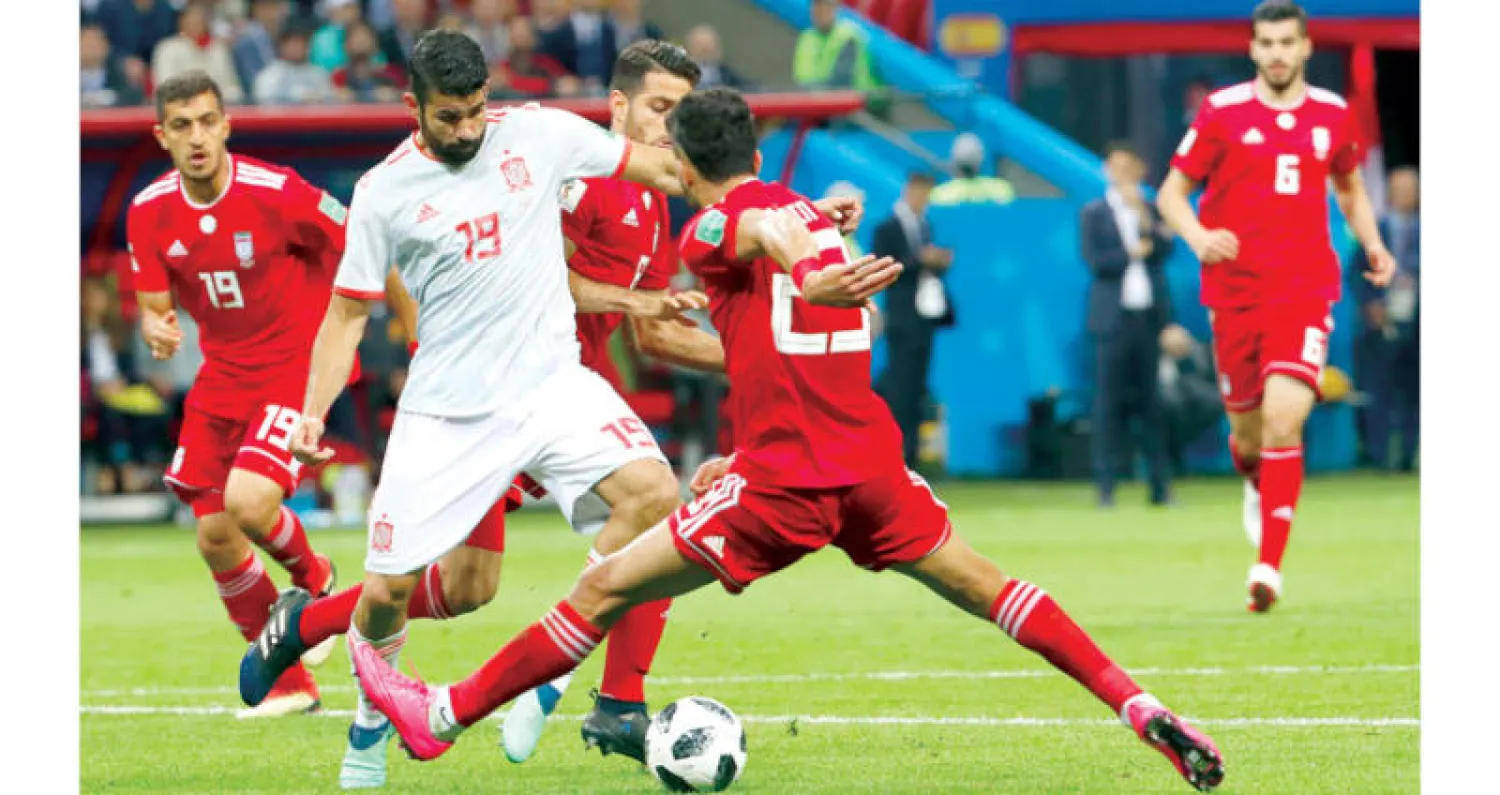 الحظ يحالف كوستا في إحراز هدف فوز إسبانيا (إ.ب.أ)