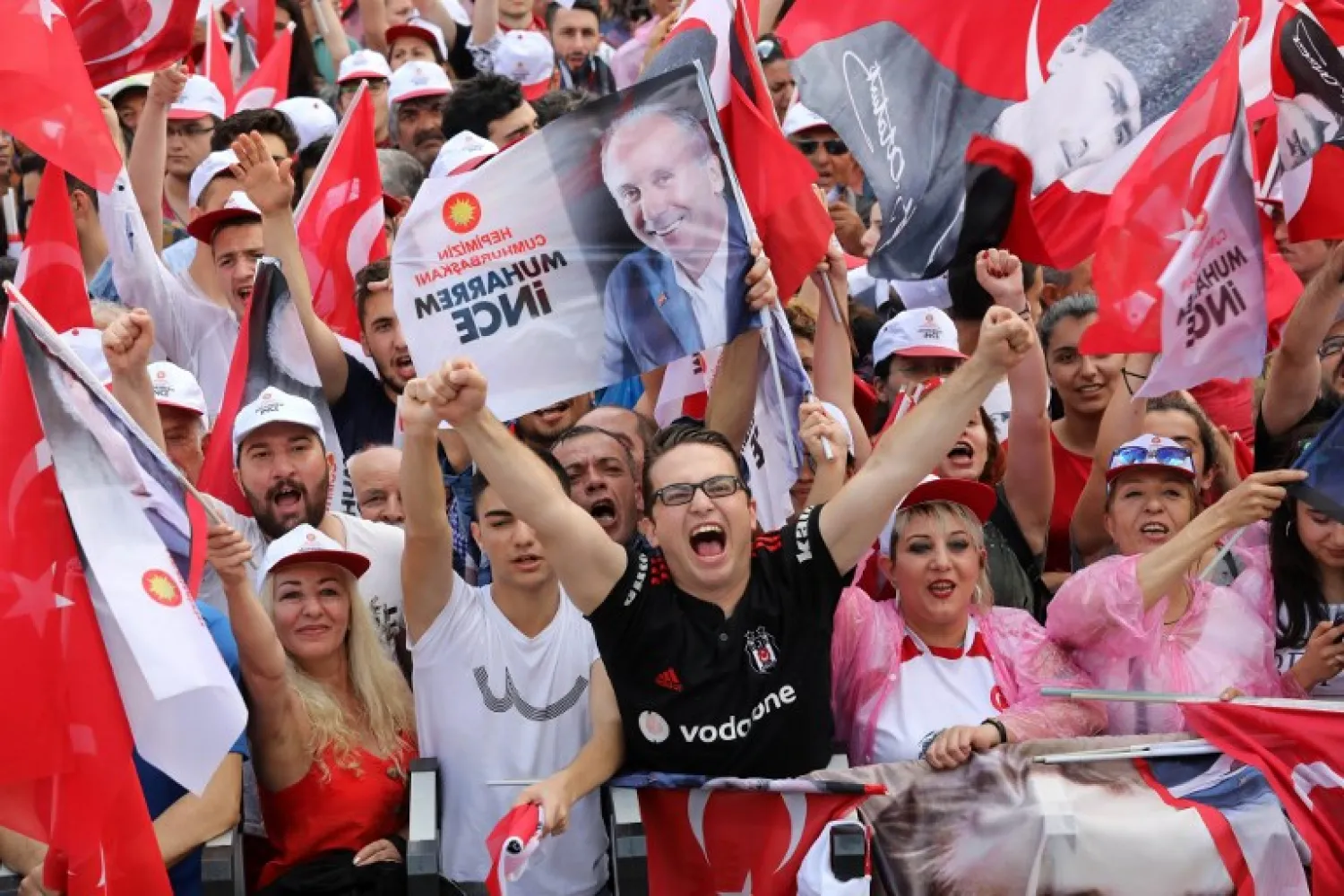 Supporters of the presidential candidate of Turkey's main opposition Republican People's Party Muharrem Ince cheer during an election rally in Ankara on June 22, 2018. ADEM ALTAN / AFP