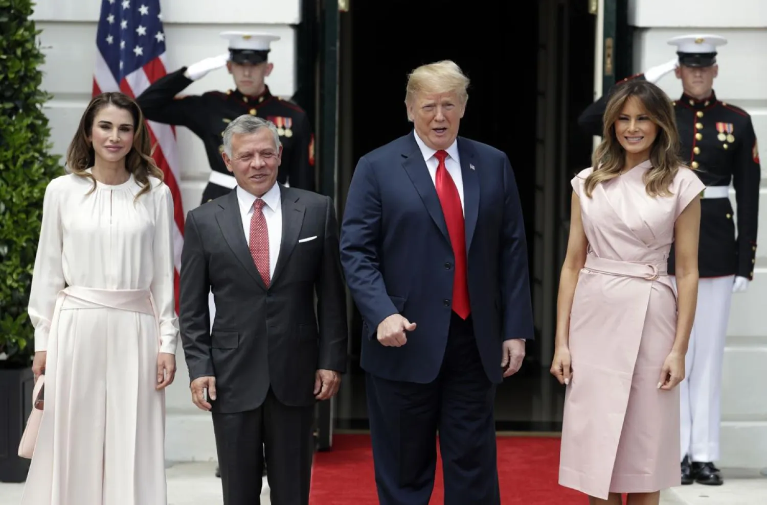 US President Donald Trump and First Lady Melania receive Jordan’s King Abdullah II and his wife Queen Rania at the White House. (AP)