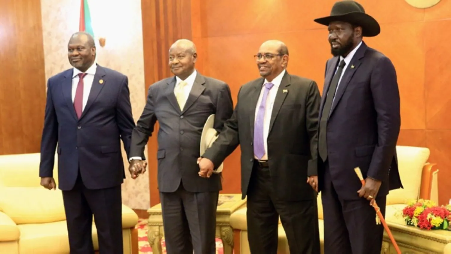 From left to right, South Sudan's opposition leader Riek Machar, Ugandan President Yoweri Museveni, Sudanese President Omar al-Bashir and South Sudanese President Salva Kiir, pose for a picture before a meeting in Khartoum on June 25, 2018. COURTESY PHOTO 