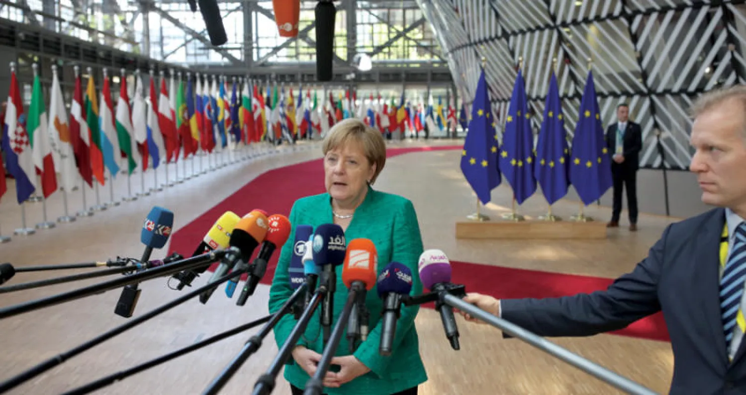قرارات القمة ربما أنقذت المستشارة الألمانية أنجيلا ميركل وائتلافها الحاكم (بلومبيرغ)