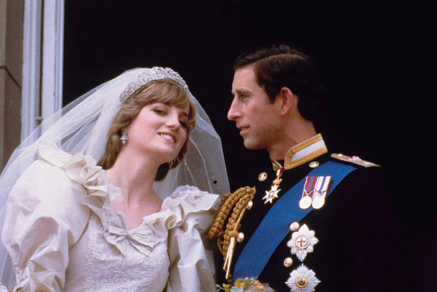 Prince Charles and his bride Diana, Princess of Wales, are shown on their wedding day on the balcony of Buckingham Palace in London, 1981. Their marriage was not a happy one. (AP)