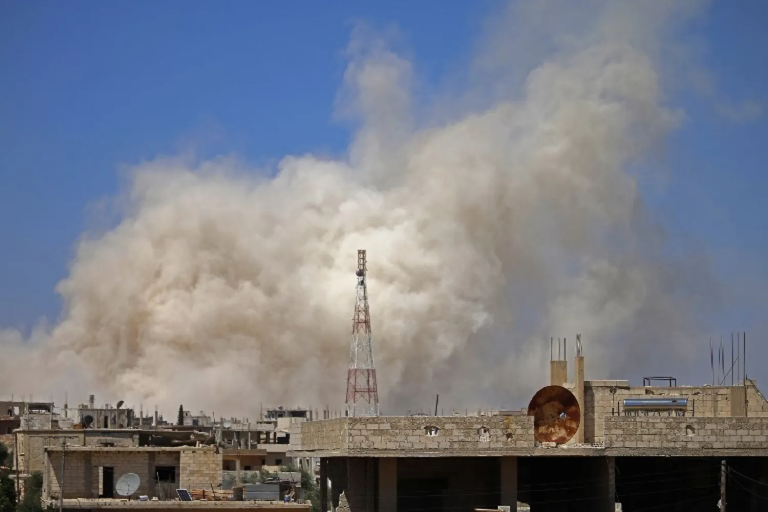 Smoke rises above opposition held areas of the city of Daraa during airstrikes by Syrian regime forces on June 29, 2018. Mohamad ABAZEED / AFP