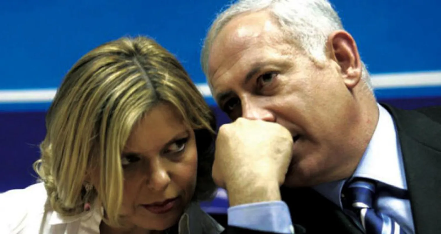 نتنياهو وزوجته سارة (أ.ف.ب)