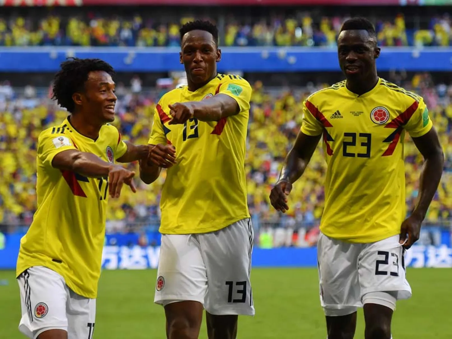 Colombia's players celebrate after scoring against Senegal. (AFP)
