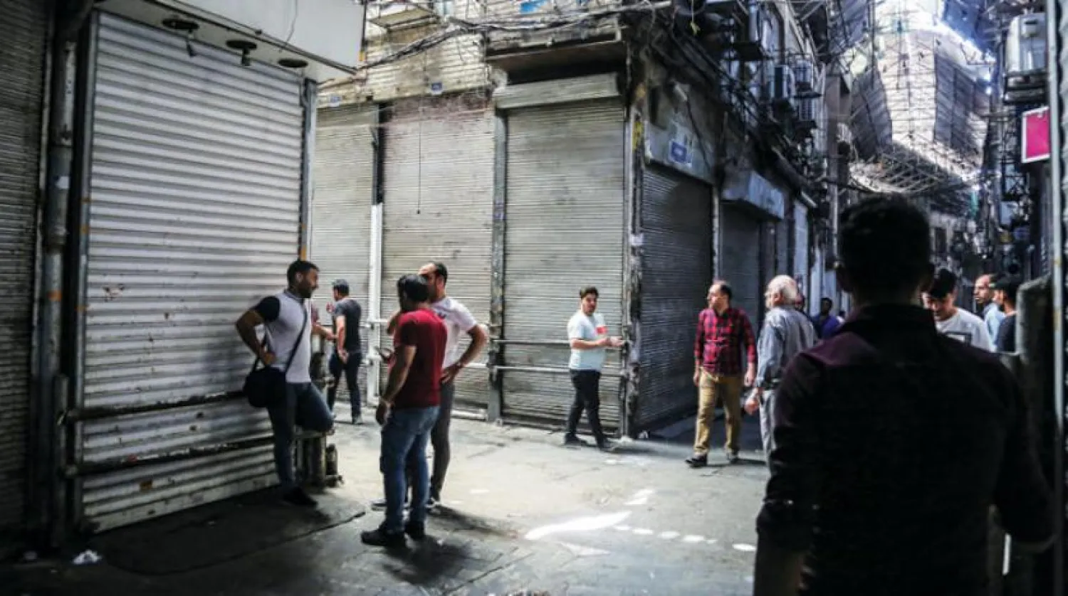 Shops closed at the Tehran bazaar during protests last week (AP)