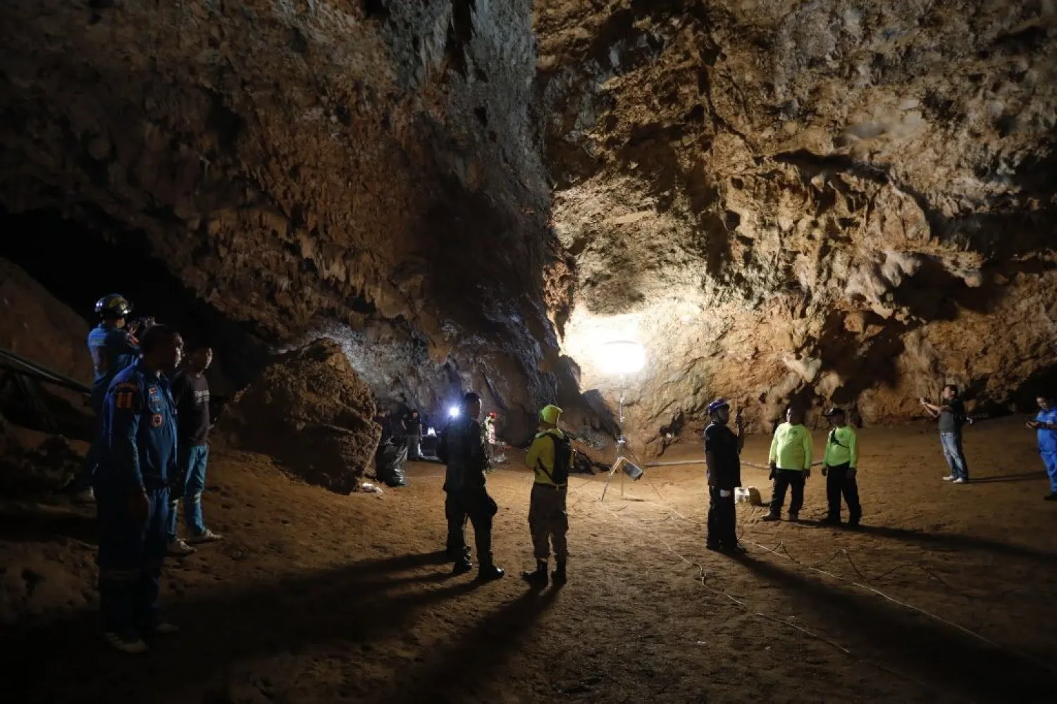 Rescue teams gather in a deep cave where the youth football team went missing in Chang Rai, northern Thailand. (AP)