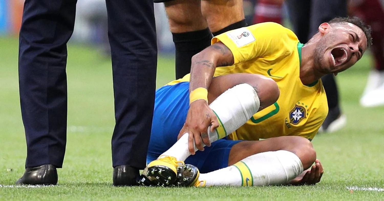 Brazil’s Neymar reacts after being fouled during his team’s match against Mexico in the World Cup round of 16. (Getty Images)