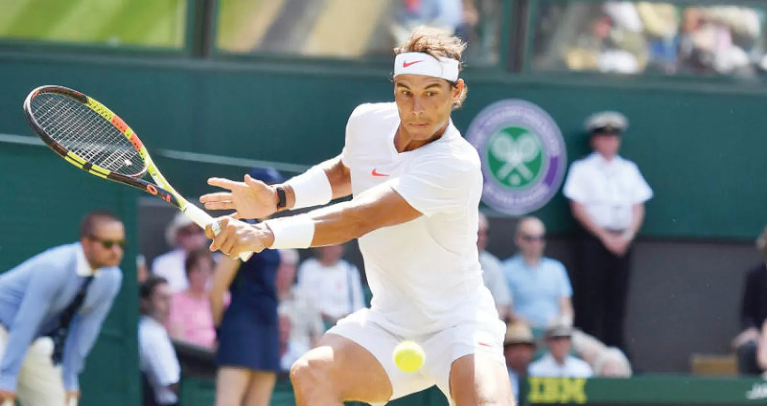 رافاييل نادال خلال المنافسات (أ.ف.ب)