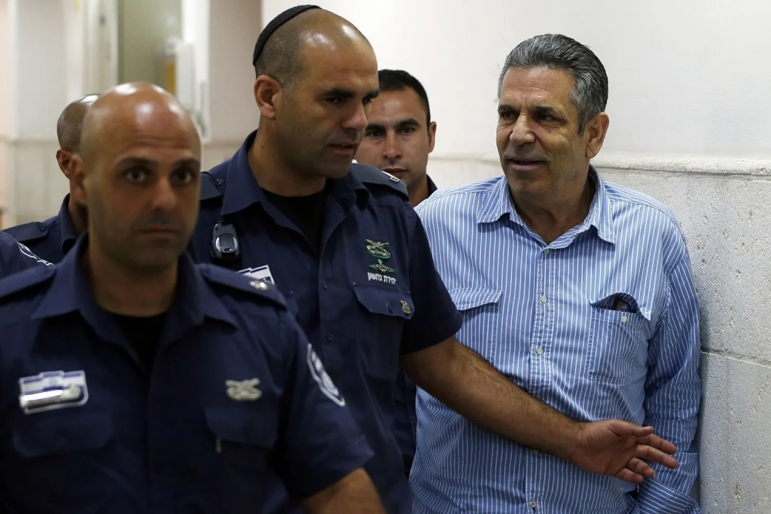 Gonen Segev, a former Israeli minister indicted on suspicion of spying for Iran, is seen in the District Court in Jerusalem. (AP)