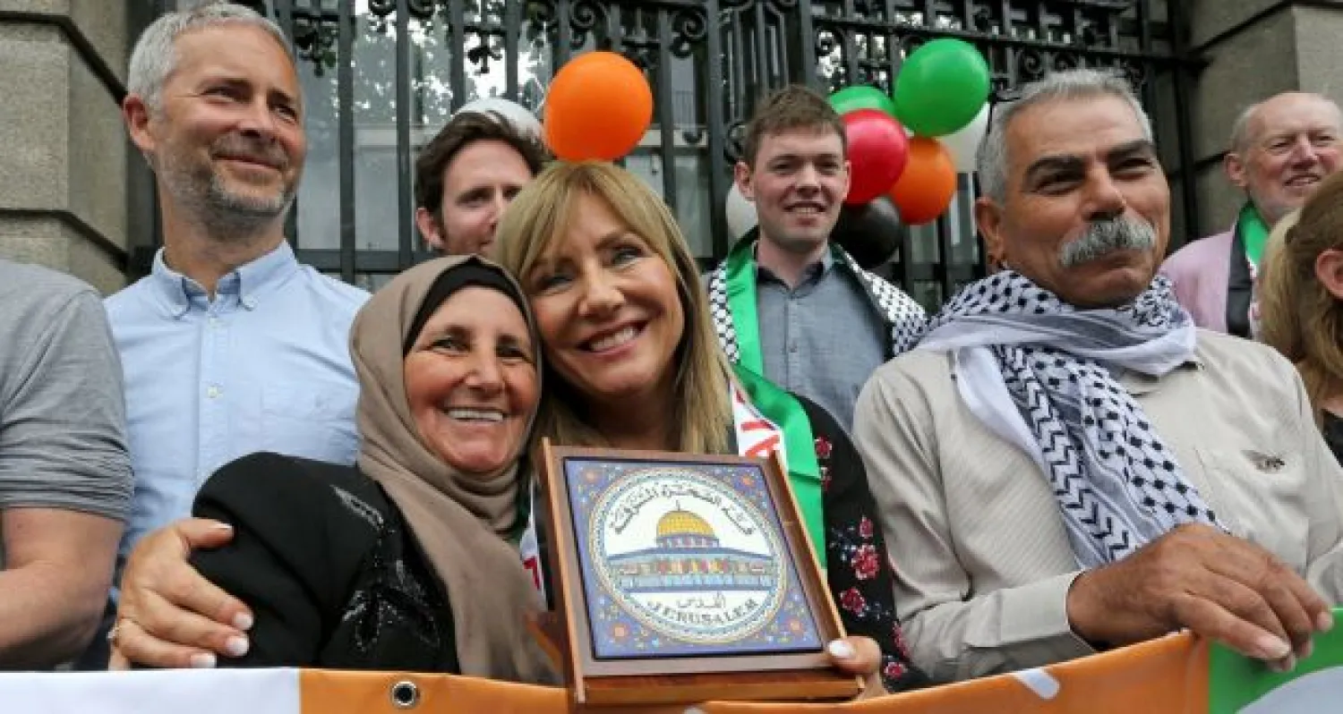 Palestinian farmer Muna al-Taneeb, from the West Bank, with Senator Frances Black outside Leinster House on Wednesday. Photograph: Crispin Rodwell/AP Images for Avaaz