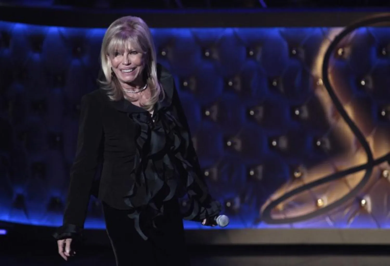 Singer Nancy Sinatra walks on stage during Sinatra 100 - An All-Star Grammy Concert in Las Vegas, Nevada December 2, 2015. REUTERS/Steve Marcus
