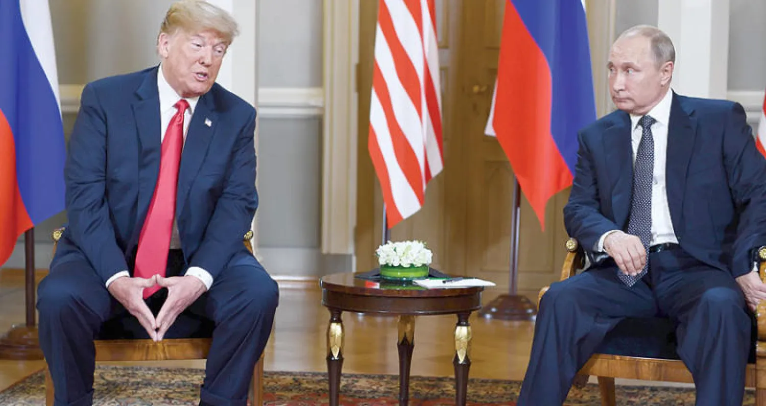 ترمب وبوتين قبل انطلاق لقائهما في هلسنكي الاثنين الماضي (أ.ف.ب)