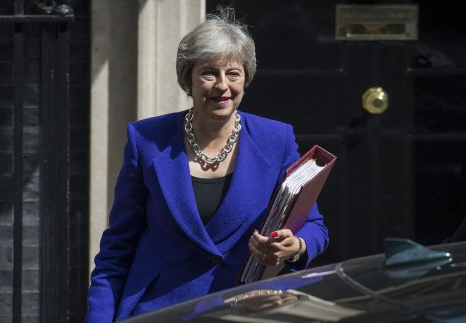 Britain’s Prime Minister Theresa May leaves 10 Downing Street in London, on Wednesday. (Dominic Lipinski/Press Association/AP)
